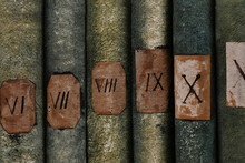 Old Books With Roman Numerals In The Library