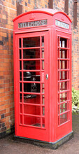 A Vintage British Red Public Telephone Box Kiosk.