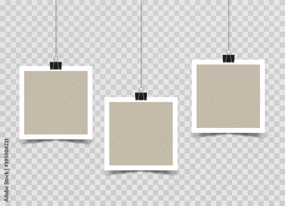Set of empty Square photo frames hanging on binder clips. Mockup on a ...