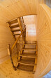 © Alexander - Oak wooden staircase in a new wooden house outside the city.