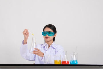 Asian women scientist with test tube making research in clinical laboratory, Science and chemistry concept, Medical technologist