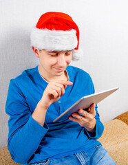 Poster - Young Man with a Tablet