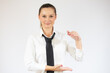 © Danko - Business woman showing something with two hand isolated on white background.