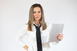© Danko - Portrait of business woman holding tablet on white background