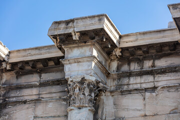 Wall Mural - Hadrians library stone facade column detail, blue sky background, Athens Greece.