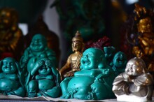 Close-up Of Laughing Buddha Statues