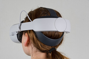 young female wearing a vr headset