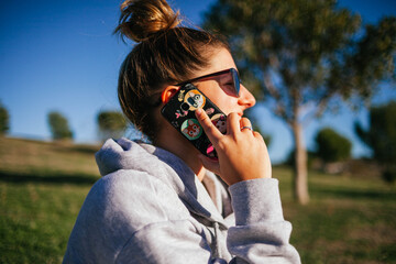 woman using mobile phone in the field