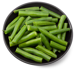 Wall Mural - green beans in a black plate isolated on white background. Clipping path and full depth of field. Top view