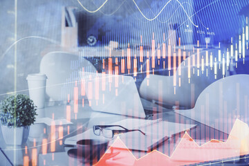 Double exposure of stock market graph drawing and office interior background. Concept of financial analysis.