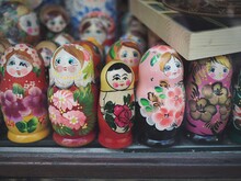 Close-up Of Multi Colored Dolls For Sale In Market