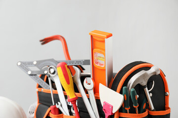 Construction tools on grey background