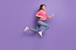 Full length body size side profile photo of jumping running fast on sale hurrying girl isolated on vibrant purple color background