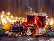 © Oksana Klymenko - Close-up of traditional Christmas mulled wine with spices and cookies on Christmas market