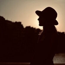 Silhouette Woman Standing Against Clear Sky During Sunset