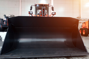 Fototapete - Metal bulldozer bucket for construction work