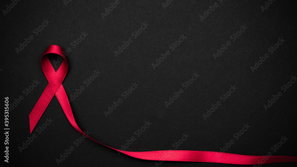 Hiv support. Red ribbon symbol in hiv world day on black background ...