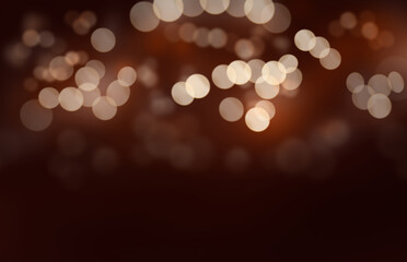 Christmas lights illumination background with blurred red and gold bokeh against a dark backdrop.