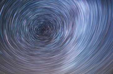 Wall Mural - beautiful starry sky with star trails orientation on the north star. space background. abstract long