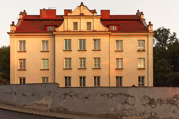 Old building in Sandomierz, Poland at the Zawichojska 1 street in first rays of light during sunrise.