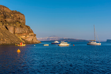 Wall Mural - A view from the island of Thirasia, Santorini on a summers evening