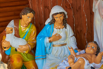 Wall Mural - Christmas figurines,statuettes of Mary with baby and shepherd with lamb