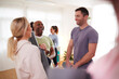 © Monkey Business - People In Exercise Clothing Meeting And Chatting Before Fitness Or Yoga Class In Community Center