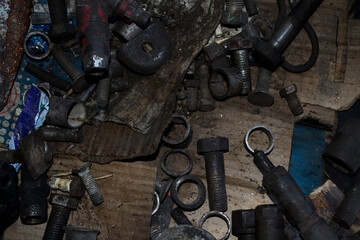 
Nuts, washers, bolts, working process. Tool in fuel oil.