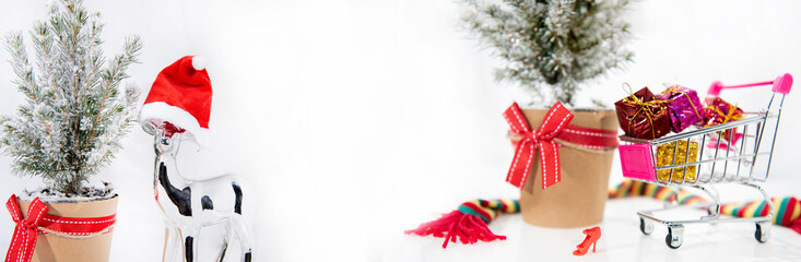 Wall Mural - Christmas tree decoration. Merry Christmas horizontal banner. Small tree isolated on white background.