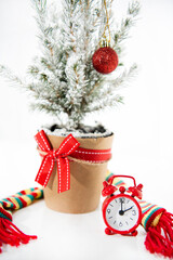 Wall Mural - Christmas decoration with alarm clock. Merry Christmas sale concept in macro. Christmas shopping  abstraction.