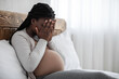 © Prostock-studio - Emotional Changes During Pregnancy. Upset Black Pregnant Woman Covering Face With Hands