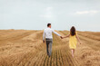 © Andriy Medvediuk - Happy young couple on straw, romantic people concept, beautiful landscape, summer season