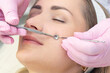 © Elena - Procedure for cleaning the skin of the face with a steel appliance with a spoon from blackheads and acne.