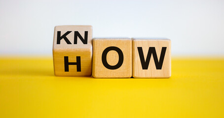 know how and business concept. turned cube and changed the word 'how' to 'know'. beautiful yellow ta