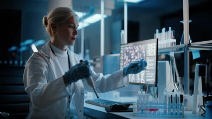 Wall Mural - medical research laboratory: portrait of female scientist working with samples, using micro pipette 