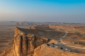 Tourists gather at Edge of the World escarpment near Riyadh, Saudi Arabia