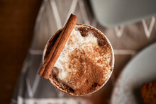 Cappuccino With Cocoa And Cinnamon Stick