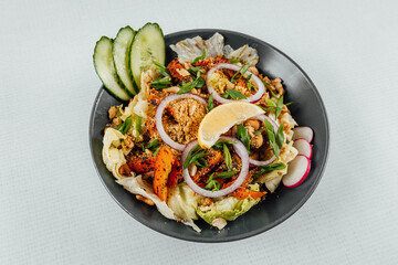 Sticker - To view closeup of roasted orange bell peppers, onion, radish, lemon and lettuce in a black bowl