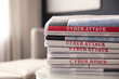 © New Africa - Stack of newspapers with headlines CYBER ATTACK on table indoors, closeup
