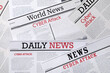 © New Africa - Newspapers with headlines Cyber Attack as background, closeup