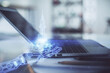 © peshkova - Desktop computer background in office and start up theme hologram drawing. Double exposure. Startup concept.