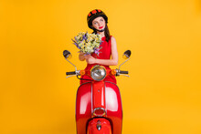 Photo Of Charming Lady Wear Red Dress Headwear Sitting Bike Holding Bouquet Looking Empty Space Isolated Yellow Color Background