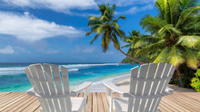 Vacations Sunny Beach With White Beach Chairs On Wooden Floor, Palm Trees And The Turquoise Sea On Tropical Island.	