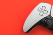 Video games white gaming controller isolated on red color background top view