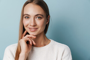 Happy beautiful woman smiling and looking at camera