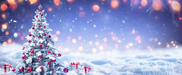 Wall Mural - snowy christmas tree with red ornament and present boxes in a winter landscape