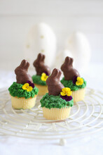 Easter Cupcakes Decorated With Chocolate Easter Bunnies