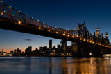 Fototapeta  - The Queensboro Bridge during the Evening with the Manhattan Skyline along the East River in New York City