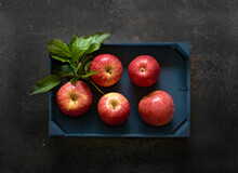 Fresh Red Elstar Apples In A Wooden Crate
