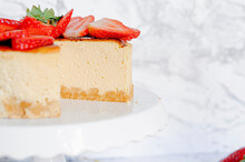 Amarula Cream Cheese Cake With Strawberries, A Piece Cut